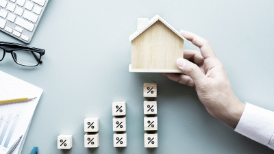 How does inflation impact housing affordability?